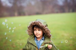 relaxed childrens portrait in Ealing park